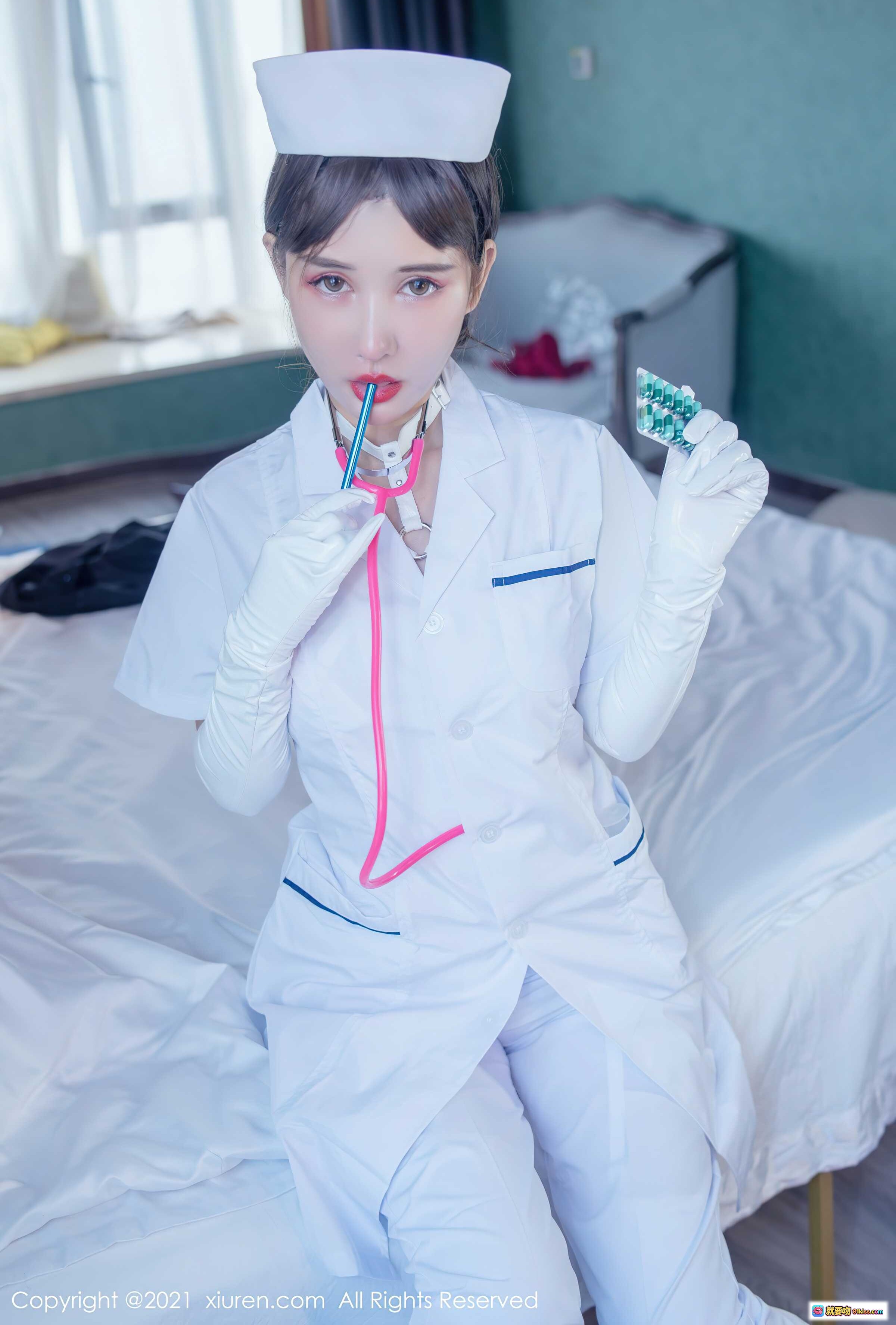 图片[2] - 夏沫沫护士装写真 | 白色制服长手套樱花背景 | XIUREN秀人网2021.11.09 No.4187 - 就要吻